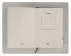 CRENA multi-year journal open to the title page and inside cover