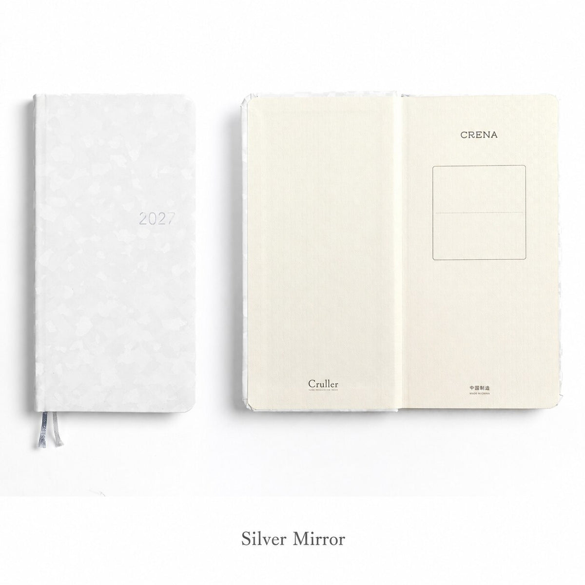 CRENA 2027 weekly planner with Silver Mirror cover, showing the front cover and inside title page