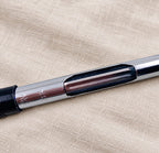 Close-up of the squeeze converter inside a Wing Sung 500 fountain pen