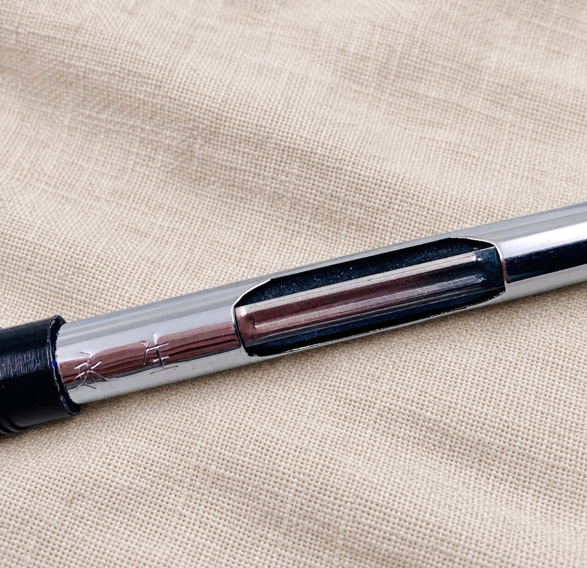 Close-up of the squeeze converter inside a Wing Sung 500 fountain pen