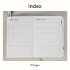 CRENA multi-year journal open to its ruled index pages