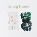 CRENA Strong Hunter hydrophobic ink swatch cards with green ink revealing a white deer design