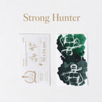 CRENA Strong Hunter hydrophobic ink swatch cards with green ink revealing a white deer design