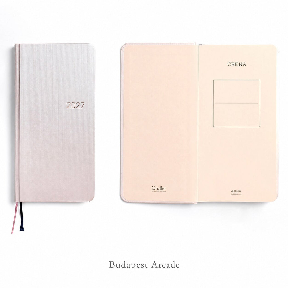 CRENA 2027 weekly planner with Budapest Arcade cover, showing the front cover and inside title page