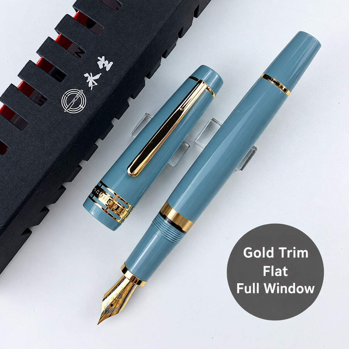 Lake-blue Wing Sung 629 fountain pen with gold-tone trim, flat ends, and a full ink window