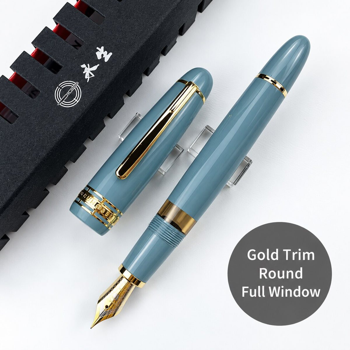 Lake-blue Wing Sung 629 fountain pen with gold-tone trim, rounded ends, and a full ink window
