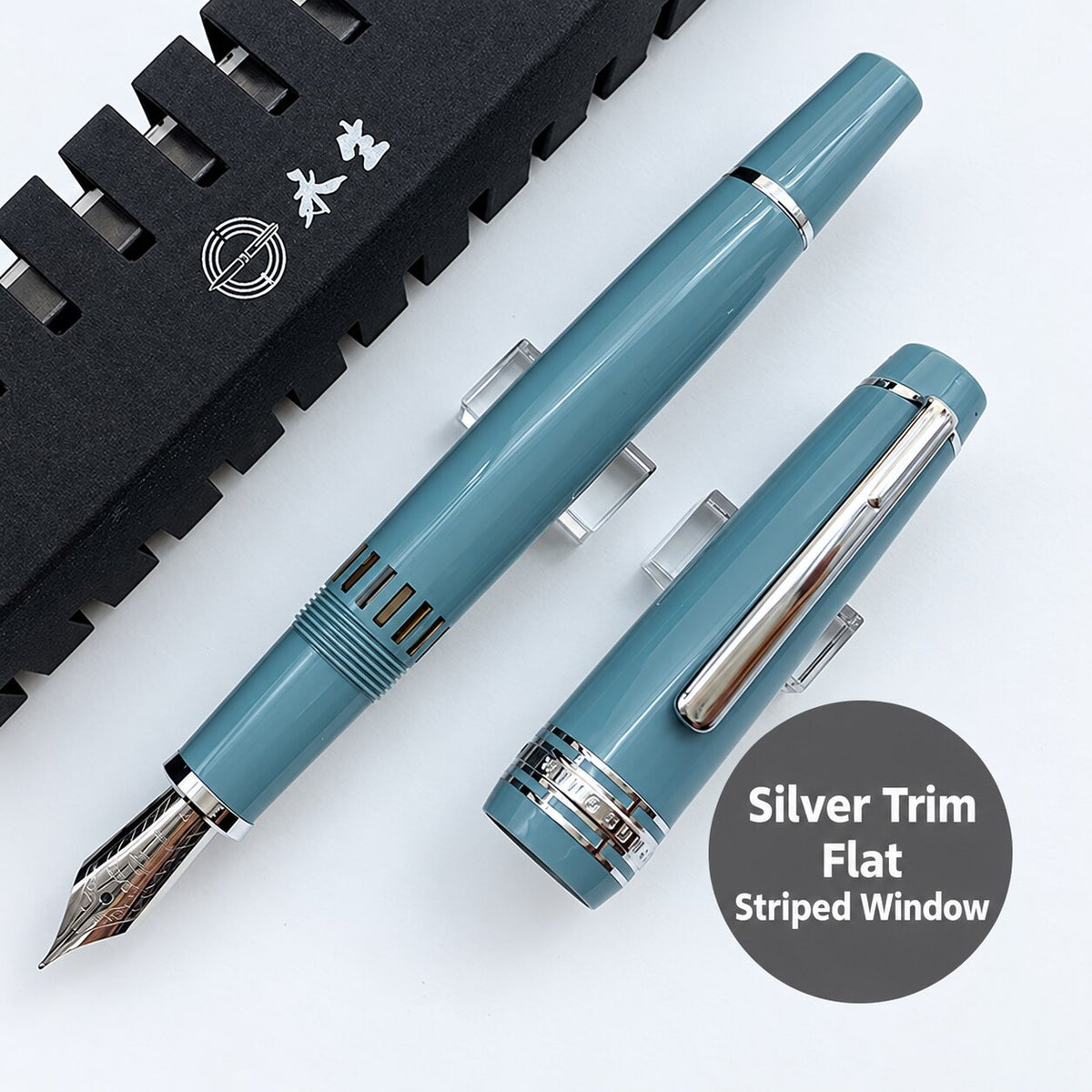 Lake-blue Wing Sung 629 fountain pen with silver-tone trim, flat ends, and a striped ink window