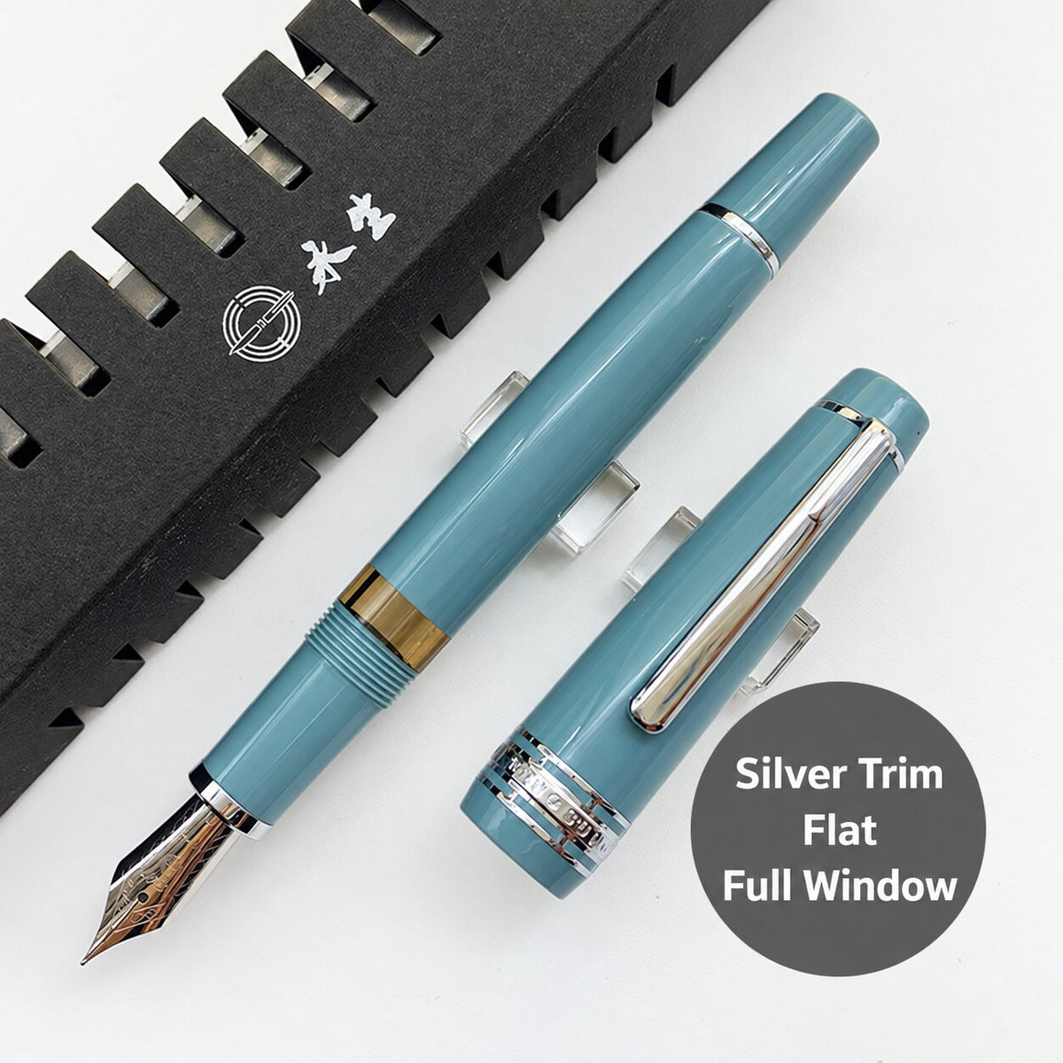 Lake-blue Wing Sung 629 fountain pen with silver-tone trim, flat ends, and a full ink window